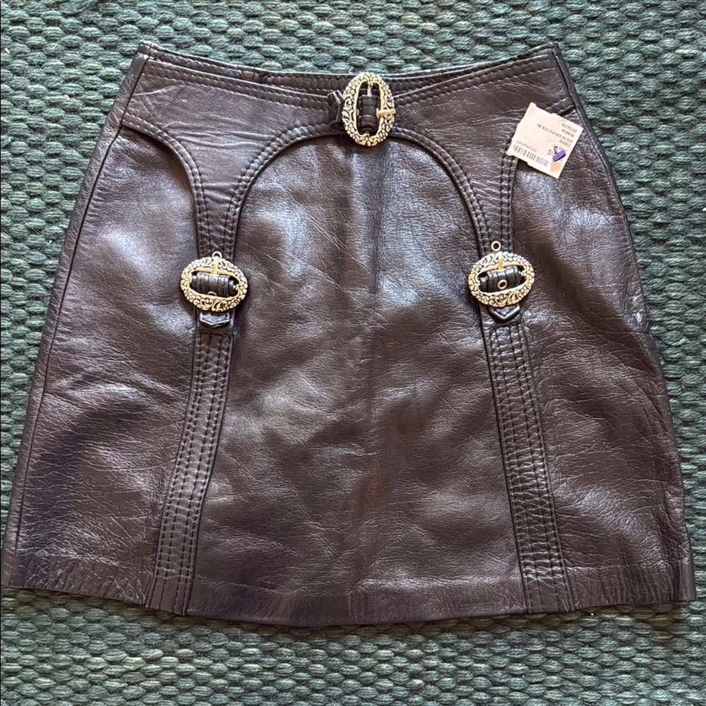 Vintage leather skirt with buckles